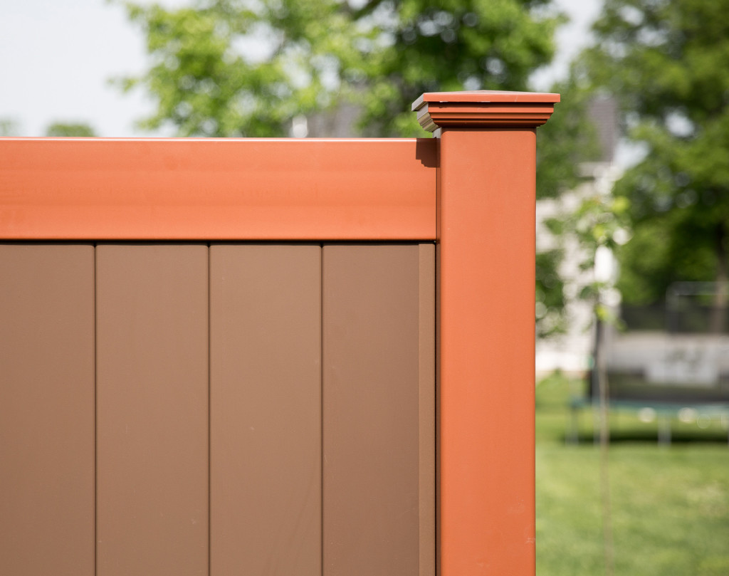 Illusions V300-6 Tongue and Groove vinyl privacy fence panels shown in Brick Red (E108) and Brown (L106). If you're looking for the great backyard idea of a PVC vinyl brown or brick red fence, Grand Illusions Color Spectrum is your match. #fenceideas #homeideas #yardideas