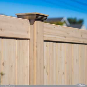 PVC Vinyl wood grain fence that looks like real wood! Eastern White Cedar grain privacy fence from Illusions Vinyl Fence. #fenceideas #backyardideas #fence #woodgrain #vinyl #pvc