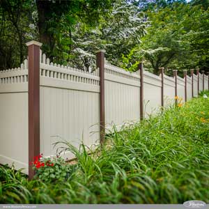 Brown and Tan PVC Vinyl Privacy Fence Panels with Stepped Classic Victorian Picket Toppers from Illusions Vinyl Fence. #fenceideas #homeideas #backyardideas #fence